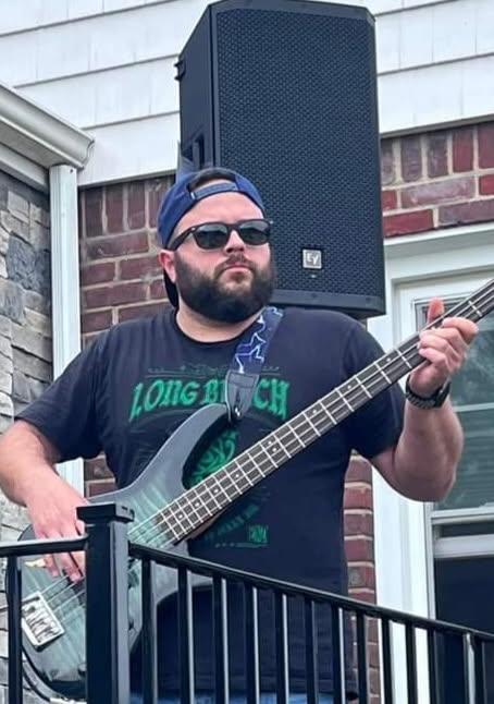 Brendan performing with The Alright Guys